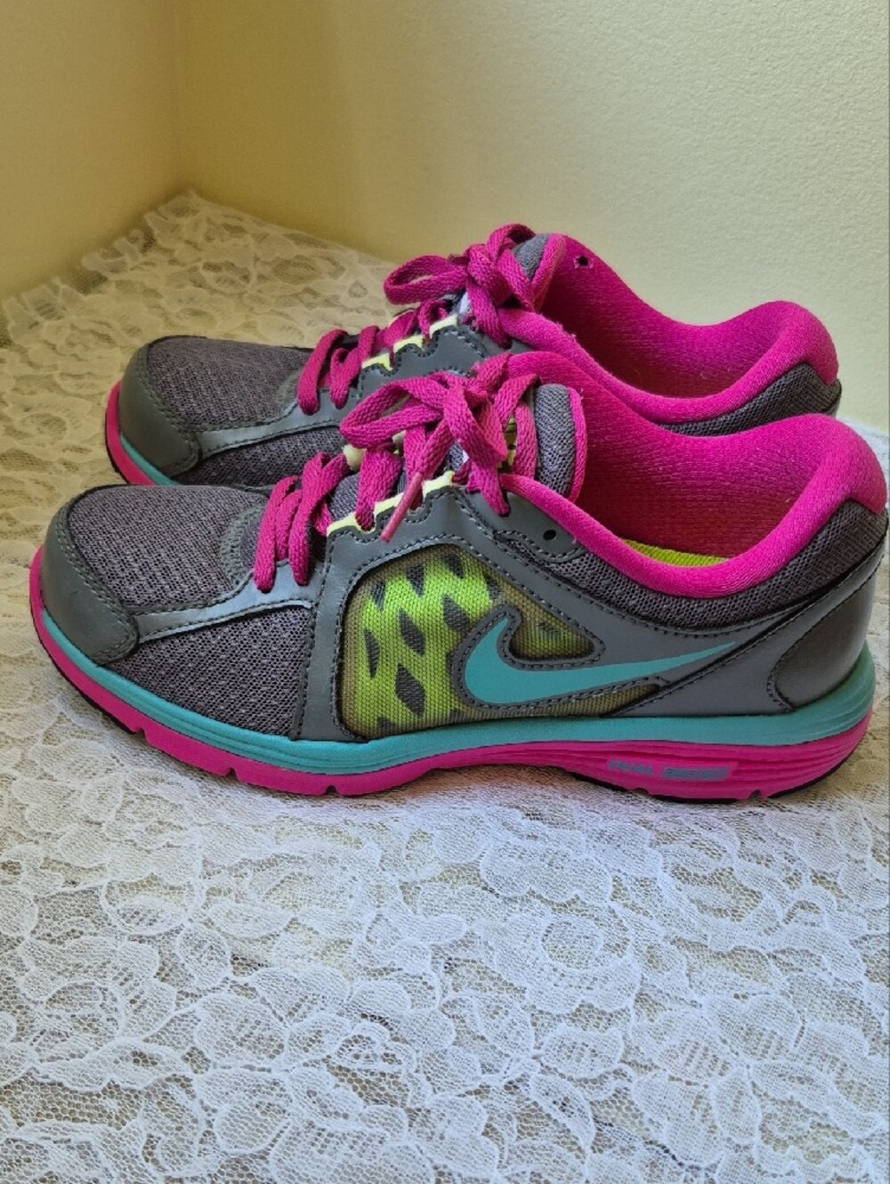 Nike Women's Gray Athletic Shoes with Pink & Teal Accents